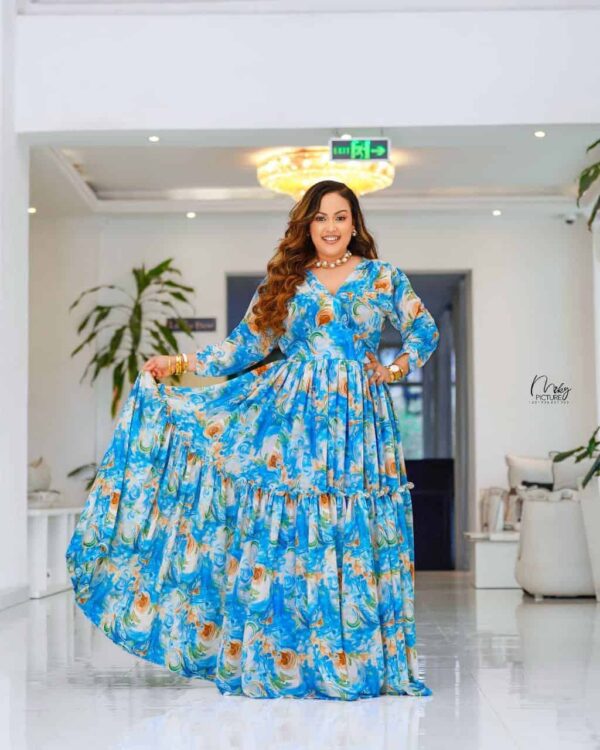 "አዲስ! ዘመናዊና ማራኪ የሐበሻ ቀሚሶች - ውብ በሆኑ ዲዛይኖች New! Flowing Modern Habesha Dress - Vibrant Prints