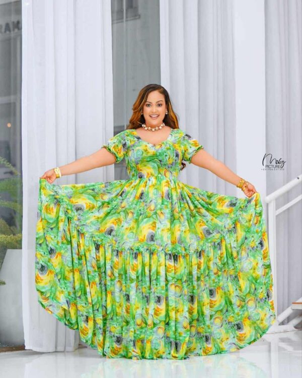 "አዲስ! ዘመናዊና ማራኪ የሐበሻ ቀሚሶች - ውብ በሆኑ ዲዛይኖች New! Flowing Modern Habesha Dress - Vibrant Prints