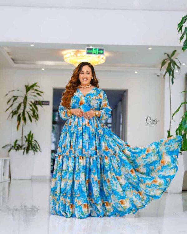 "አዲስ! ዘመናዊና ማራኪ የሐበሻ ቀሚሶች - ውብ በሆኑ ዲዛይኖች New! Flowing Modern Habesha Dress - Vibrant Prints
