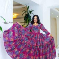 95f5568f-6483-44a9-8a19-1bfc9891e8aa.jpeg Elegant Habesha Bloom Dresses: Vibrant Ethiopian & Eritrean Inspired Gowns