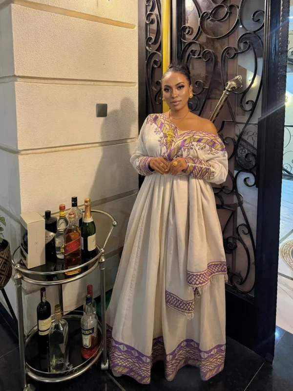 ግርማ ሞገስ ያለው ቀይ የሀበሻ ባህላዊ ቀሚስ - በፊደል ማርካቶ Ethiopian Traditional Dress –