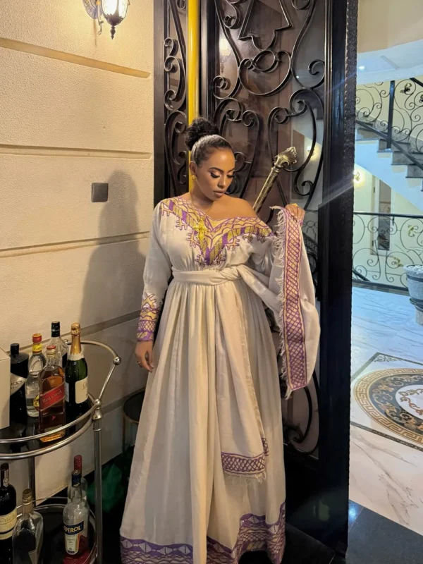 ግርማ ሞገስ ያለው ቀይ የሀበሻ ባህላዊ ቀሚስ - በፊደል ማርካቶ Ethiopian Traditional Dress –
